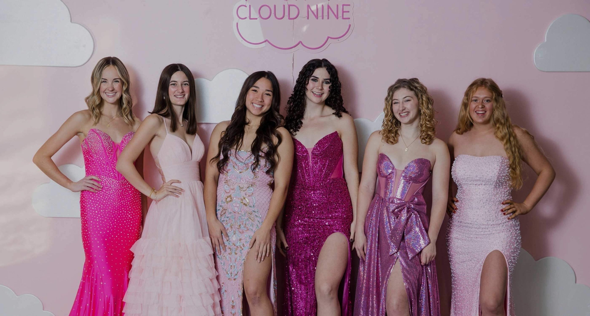 Models wearing a homecoming collection dresses